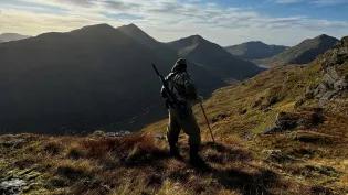 Person on a mountain enjoying the view