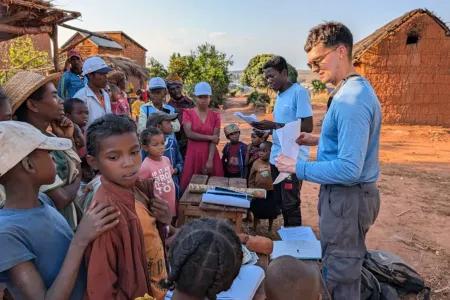 Elliot Fisher talking to a group of people in Madagascar
