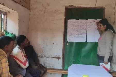 Co-author Laura Rafanomezantsoa describing the cognitive mapping process to participants in a classroom in Madagascar